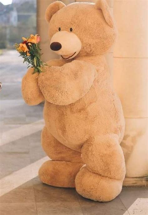 Giant Teddy Bear with Flowers