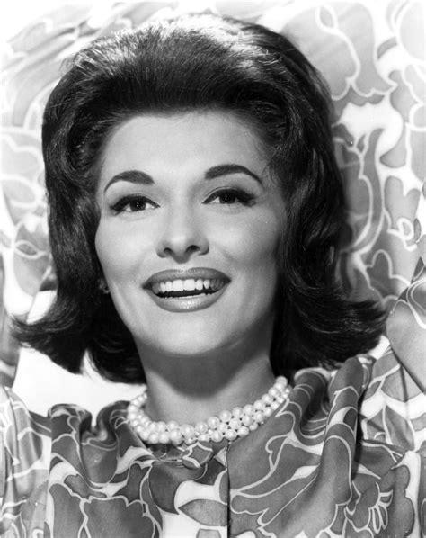 A Portrait Of Nancy Kovack Wearing A Pearl Necklace Photo Print (8 x 10