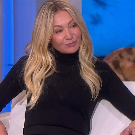 Download Portia De Rossi Smilingin Black Turtleneck Wallpaper