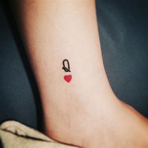 queen  hearts tattoo wrist