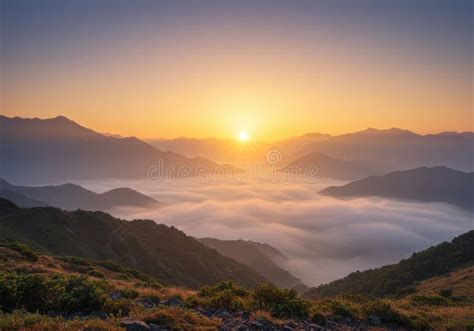 majestic mountain sunrise  rolling clouds scenic valleys stock