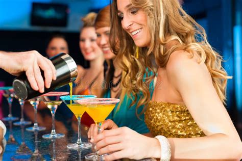 People In Club Or Bar Drinking Cocktails Stock Image - Image: 27039289