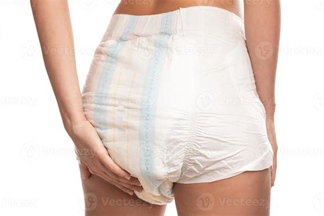 Woman wearing adult diaper against white background. 16251982 Stock