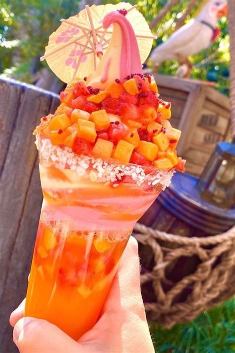 Disneyland s new tropical dole whip float is a raspberry and lemon ...