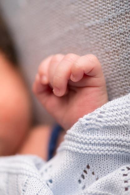 Premium Photo | Newborn baby little hands body part affection motherhood