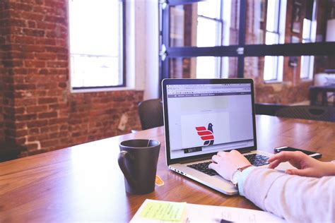 Person Using Macbook · Free Stock Photo