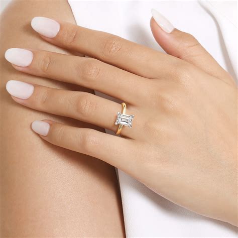 emerald cut hidden halo engagement ring gold 2