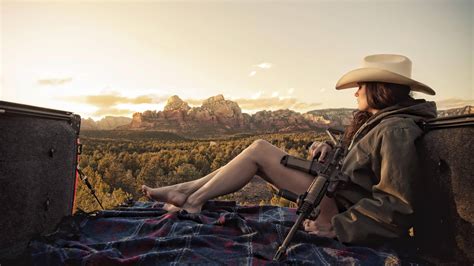 Download Country Western Cowgirl Gun Resting Wallpaper | Wallpapers.com