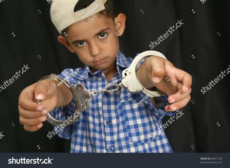 Young Kid With Steel-Cuffs Bonded Stock Photo 82091182 : Shutterstock