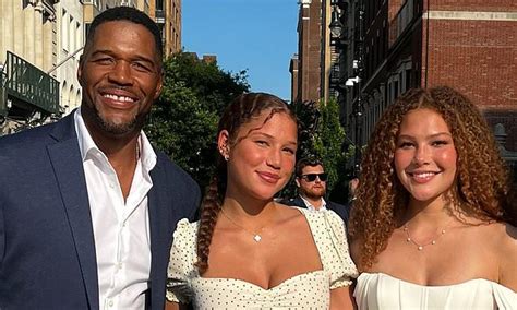 Michael Strahan is proud as twin daughters graduate high school, headed ...