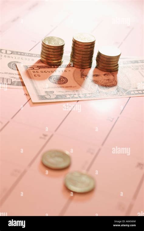 banknotes  coins  calendar stock photo alamy