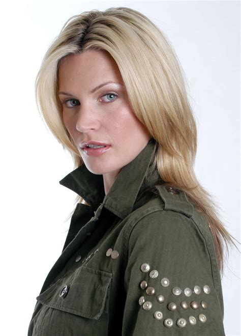 Download Natasha Henstridge posing in a stunning outfit Wallpaper