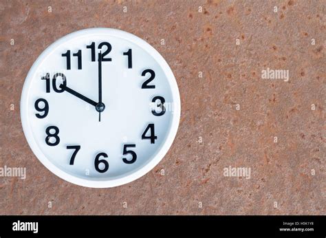 clock show    pm  steel rusty background  copy space