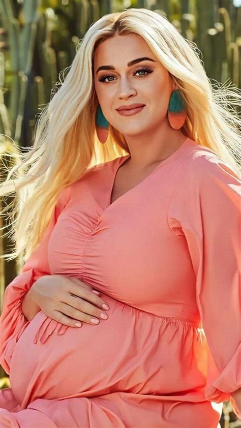 a pregnant woman sitting in front of cacti wearing large earrings and a ...