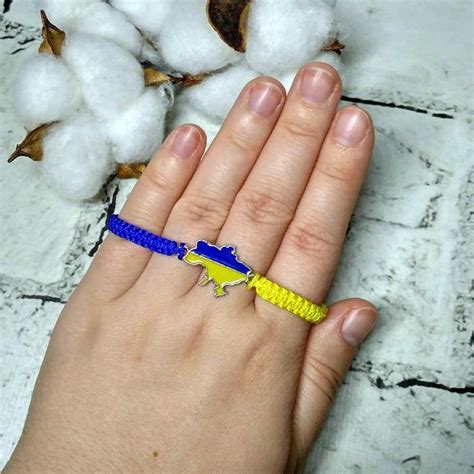 Браслет желто-голубой плетеный с талисманом карта украины — цена 80 грн ...