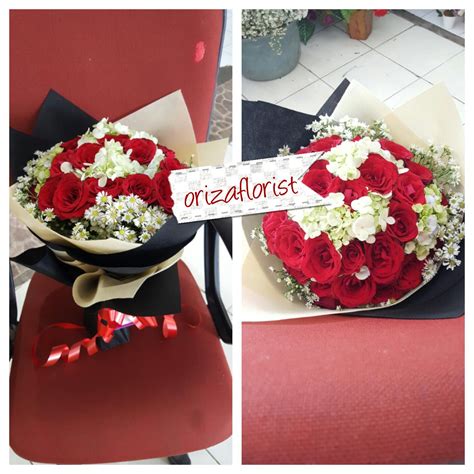 bunga tangan mawar merah  oriza florist