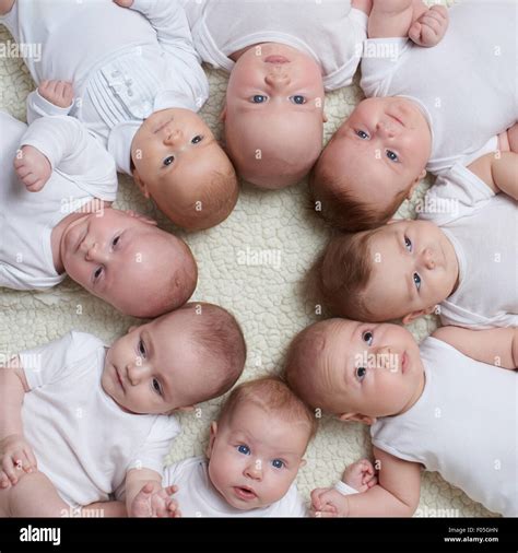 cute babies on light background Stock Photo - Alamy