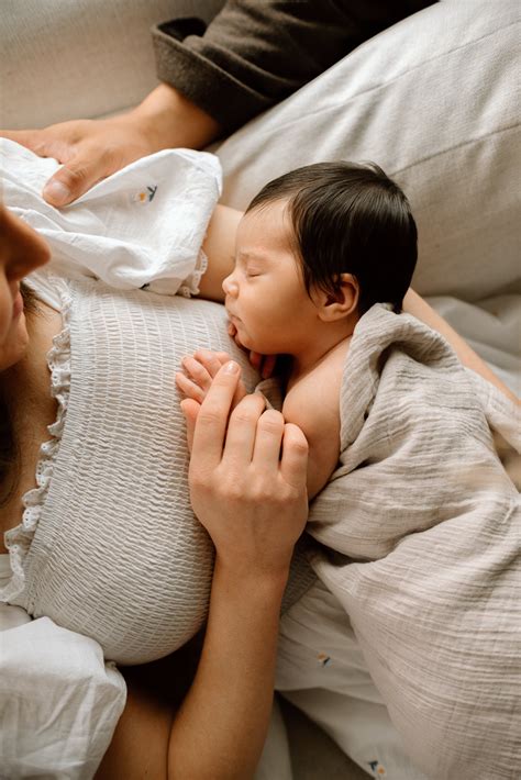 Newborn Baby Sleeping With Mom