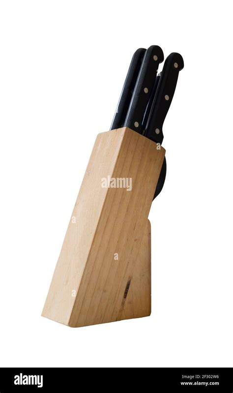 Wooden knife stand on white background. Kitchen accessories close-up ...