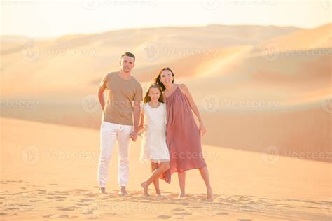 People among dunes in Rub al-Khali desert in United Arab Emirates