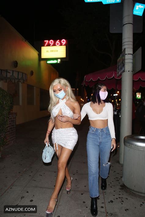 Nikita Dragun exits a party with Charli D'Amelio in Hollywood Hills
