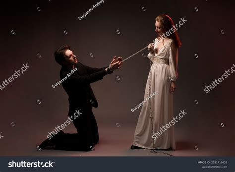 Man Tied Hands Kneeling Near Woman Stock Photo 2331419633 | Shutterstock