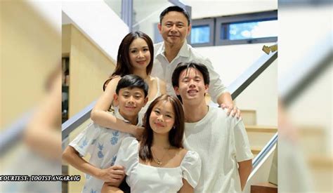 white tootsy angara shares family christmas portrait
