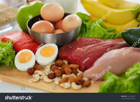 Стоковая фотография 541246537: Здоровые продукты. Ассортимент различных ...