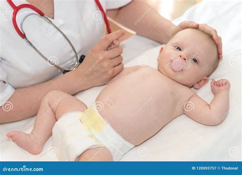 pediatrician examining baby stock image image  clinic infant