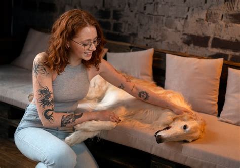 Free Photo | Medium shot woman with cute greyhound dog
