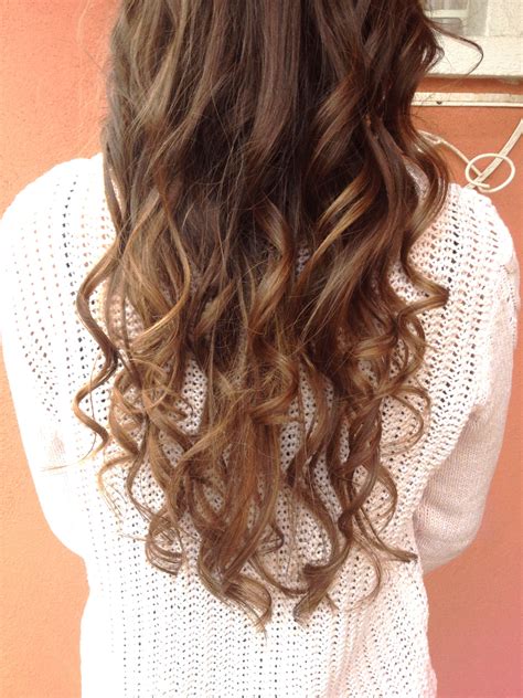 This caramel highlights curly hair technique prevents damage to locks 6