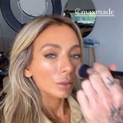 nadia bartel flashes abs  skin tight outfit  instagram newscom