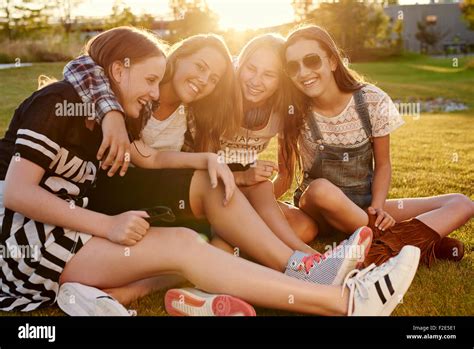 group of students or teenagers hanging out Stock Photo - Alamy