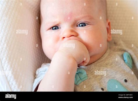 newborn baby, yellow background Stock Photo - Alamy