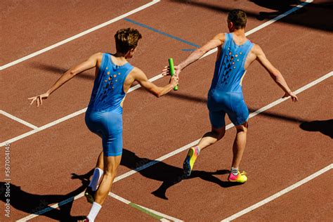 male relay race running for track and field competition Stock Photo ...