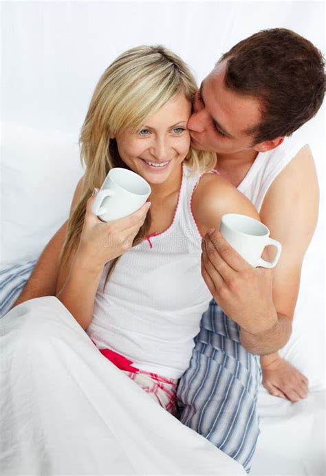 Couple in Bed Drinking Coffee with Affection Stock Photo - Image of ...