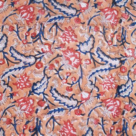 pure cotton jaipuri peach  blue  dark peach flower jaal hand bl