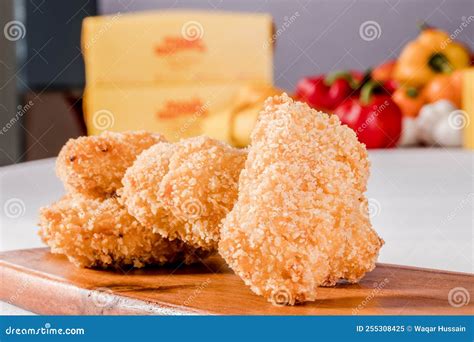 Chicken Musahab Meal Isolated on Wooden Board Side View on Grey