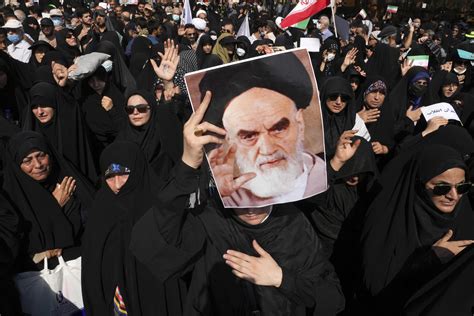 Pro-government rallies held in Iran amid mass protests | AP News
