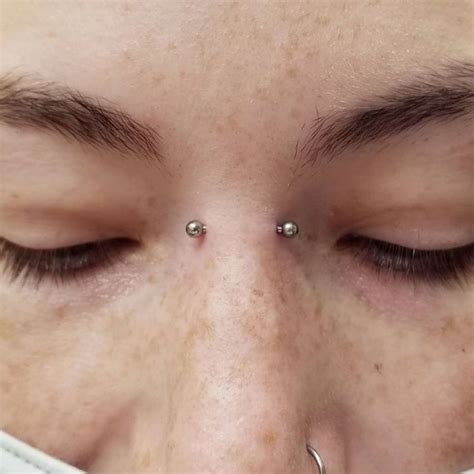 bridge piercing guide placement pain aftercare