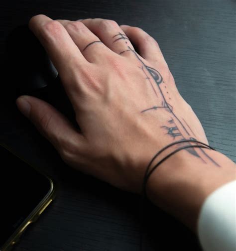 minimalist hand tattoo ideas  men clean designs  speak volumes