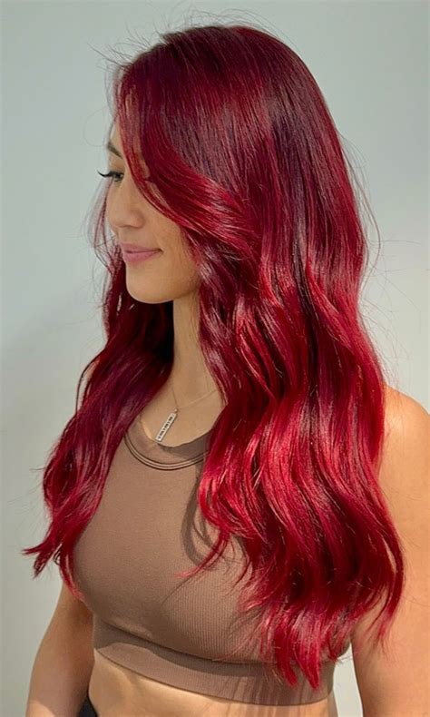 red hair colours youll adore radiant ruby long loose waves