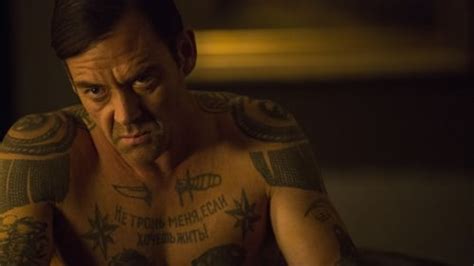 Look! The meaning of those Equalizer tattoos