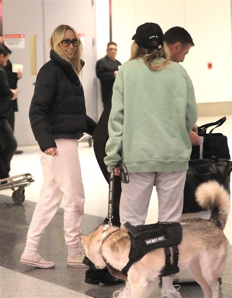 TISH and BRANDY CYRUS with Their Service Dog Arrives in Los Angeles 02