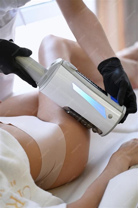 Premium Photo | Beautiful woman enjoys buttocks massage with endosphere