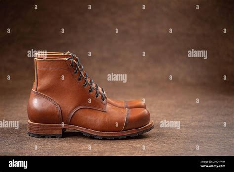 Handcrafted brown leather boots Stock Photo - Alamy