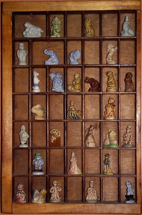 Pin by Sabina Mugford on Red Rose Tea Wade | Figurine display, Red rose ...