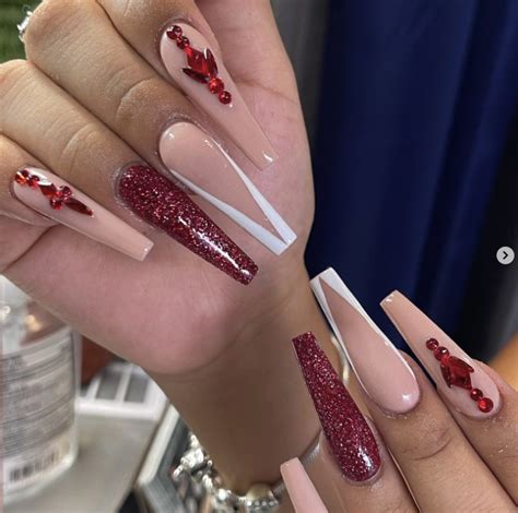 Sparkle and Shine with 50 Ravishing Red Glitter Nail Designs: Elevate Your Glam Game!