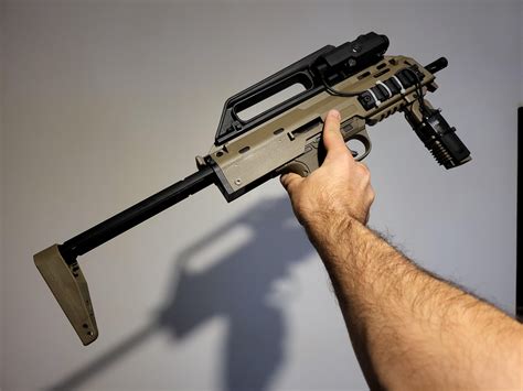 Considering buying one of these 1911s. What do you recomend; CO2 or