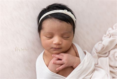 Newborn Baby Girl With Black Hair